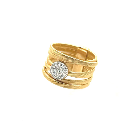 Yellow gold layered fashion ring with diamond cluster