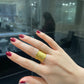 Brushed Gold Ring with Embedded Diamonds